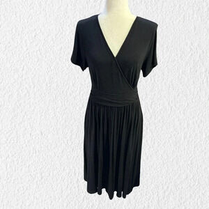 WEACZZY Black Faux Wrap Midi Dress with Pockets Size M - Versatile Flattering